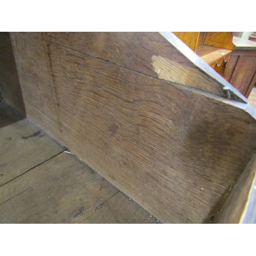 1459 - A 17th century oak writing slope, the rising lid enclosing four small drawers, with steel butterfly ... 