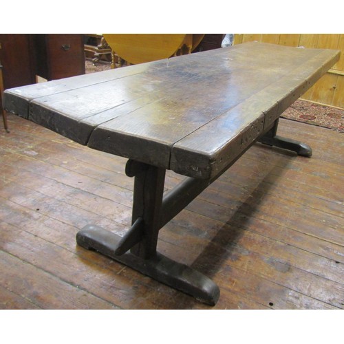 1461 - An early English oak refectory table, the massive top raised on a simple pegged stretcher base, the ... 