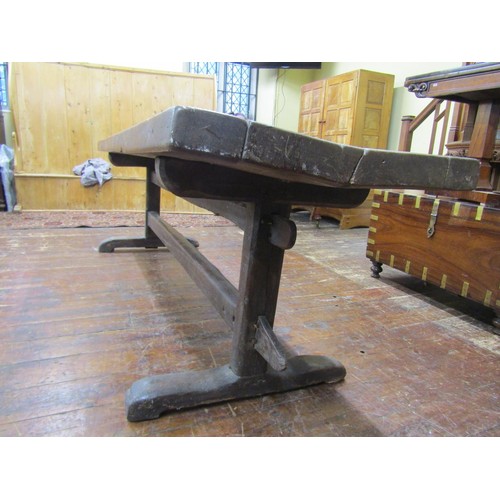 1461 - An early English oak refectory table, the massive top raised on a simple pegged stretcher base, the ... 