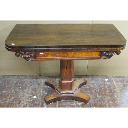 1466 - A Regency rosewood D-end fold over top card table, raised on a tapering column and platform base, 91... 