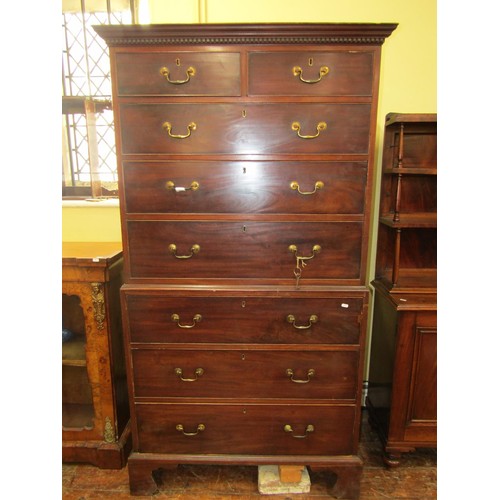 1467 - A Georgian mahogany chest on chest of six long and two short graduated drawers set beneath a dentil ... 