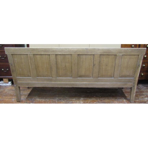 1471 - A Georgian bleached oak settle with panelled back and turned supports, 95cm high x 185cm x 65cm