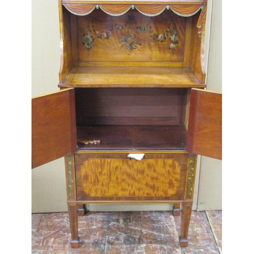 1483 - A Sheraton revival satinwood cabinet, the lower section enclosed by a pair of doors and drop leaf, t... 