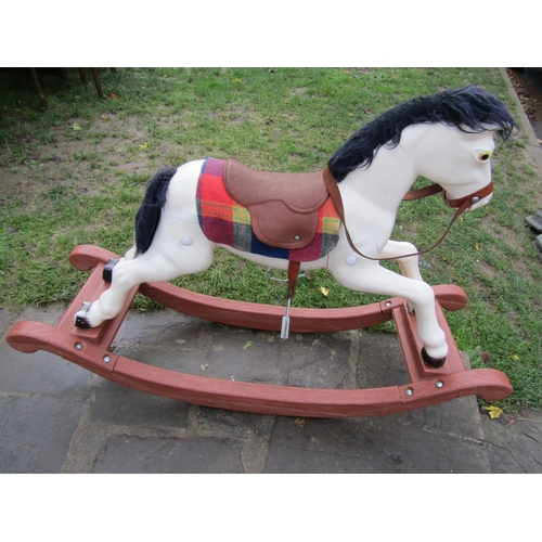 752 - A modern 'Sharna' ware bronco rocking horse with original box.
Assembled size: 129cm long x 41cm wid... 