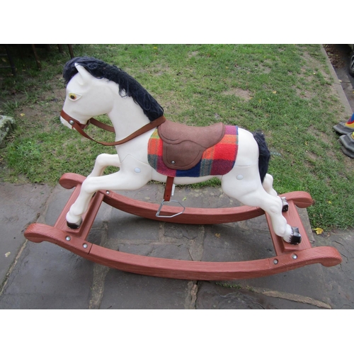 752 - A modern 'Sharna' ware bronco rocking horse with original box.
Assembled size: 129cm long x 41cm wid... 