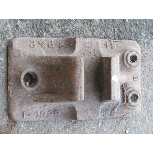 1037 - A weathered cast iron railway track line shoe