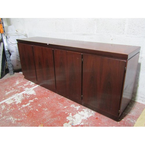 1545 - In the style of Uldum Møbelfabrik, a Danish design Indonesian rosewood veneered sideboard, fitted wi... 