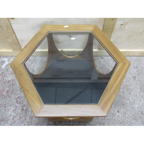 1519 - A teak hexagonal occasional / coffee table with inset glass top, 42cm high, 72cm diameter.