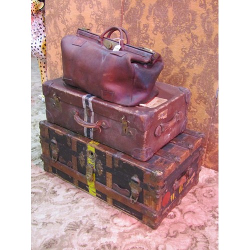 1150 - A leather Gladstone bag with brass fittings, an antique steamer trunk timber lathe and steel bound, ... 