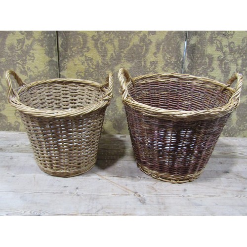 1075 - A Fortnum & Mason picnic basket together with two others and two further wicker two handled log bask... 