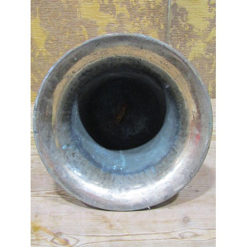 1084 - A heavy cast bronze bell (lacks clanger), 30 cm high x 31.5 cm diameter