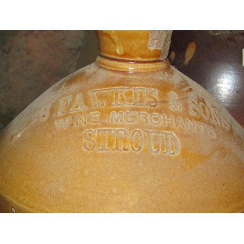 1092 - A 19th century salt glazed stoneware four gallon flagon stamped W J Shergold Wine and Spirit Merchan... 