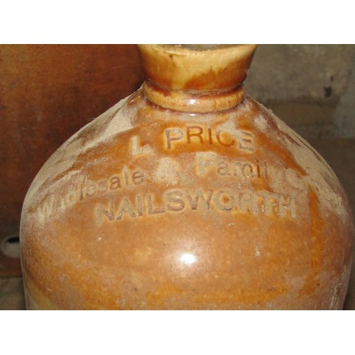 1092 - A 19th century salt glazed stoneware four gallon flagon stamped W J Shergold Wine and Spirit Merchan... 