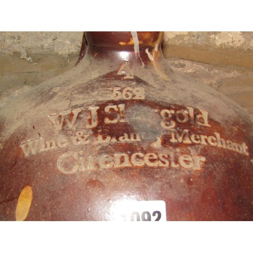 1092 - A 19th century salt glazed stoneware four gallon flagon stamped W J Shergold Wine and Spirit Merchan... 