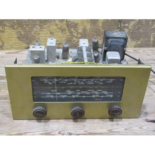 1103 - A vintage valve radio (lacks shell/case) together with a small collection of vintage valves mainly i... 