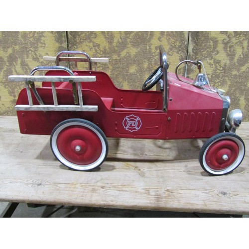 1086 - A contemporary vintage style child's pedal car in the form of a fire truck