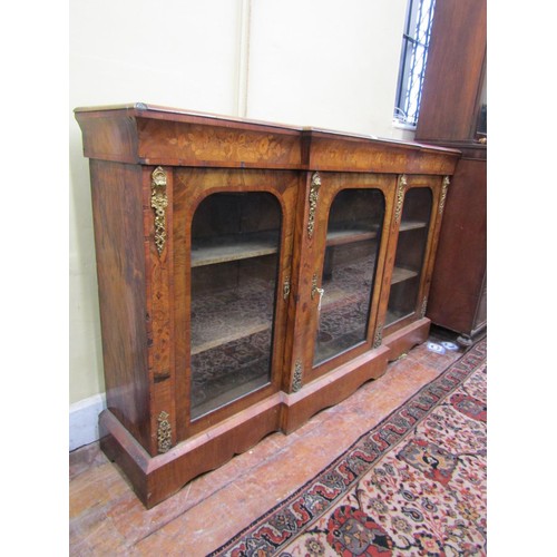 1437 - A Victorian walnut and figured walnut breakfront credenza with floral marquetry detail and applied g... 