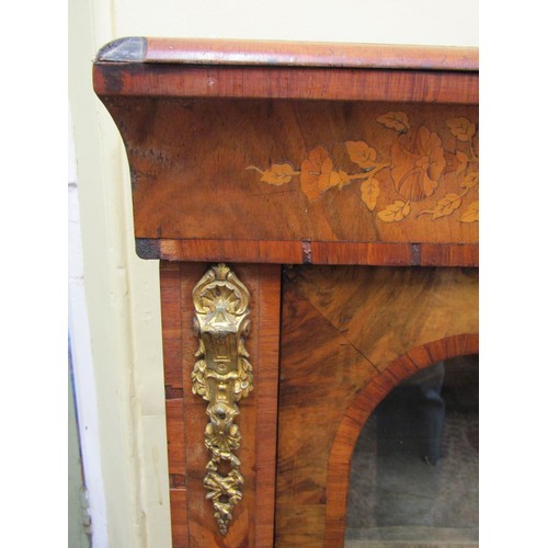 1437 - A Victorian walnut and figured walnut breakfront credenza with floral marquetry detail and applied g... 