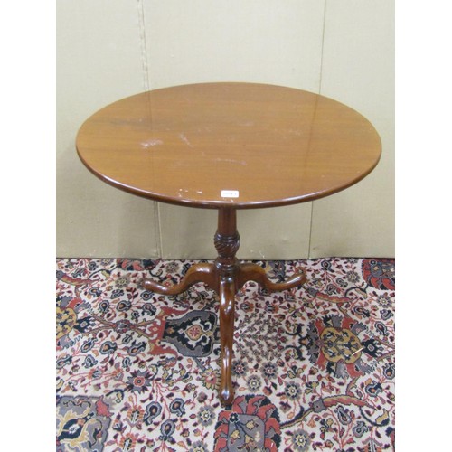 1480 - A Georgian mahogany snap top table, the one piece top 73 cm in diameter, raised on a turned and flut... 