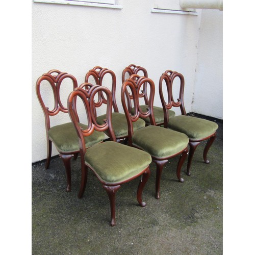 1493 - A set of six good quality Victorian mahogany dining chairs, with scrolled carved backs over fixed co... 