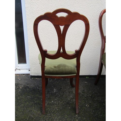 1493 - A set of six good quality Victorian mahogany dining chairs, with scrolled carved backs over fixed co... 