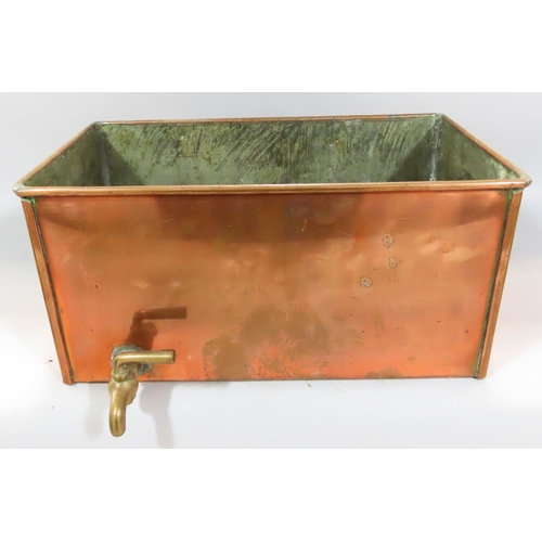 533 - A 19th century copper cistern, three copper kettles, a large saucepan together with a cast iron set ... 