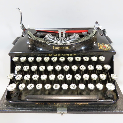 534 - An early 20th century Imperial Typewriter with it's original carry case.