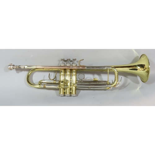 535 - An Elkhart and chrome brass trumpet with case, a Buffet Crampon flute, and an unmarked flute. (3)