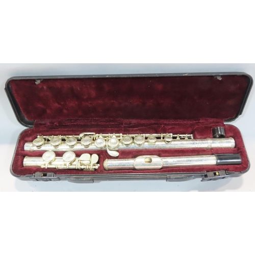 535 - An Elkhart and chrome brass trumpet with case, a Buffet Crampon flute, and an unmarked flute. (3)