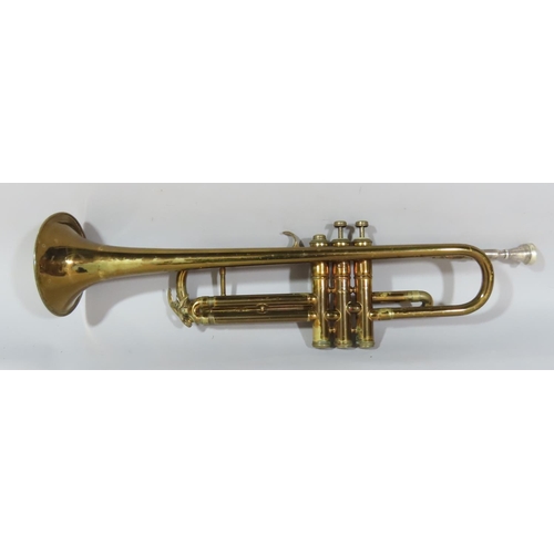 536 - A vintage brass Regent Trumpet in a leather case. (In need of restoration)