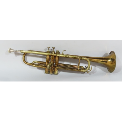 536 - A vintage brass Regent Trumpet in a leather case. (In need of restoration)