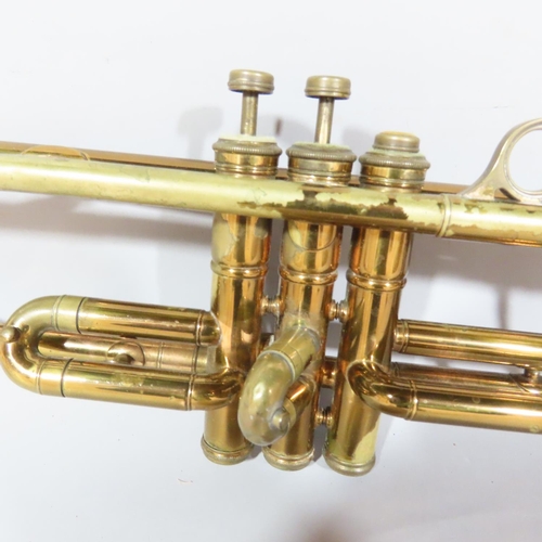 536 - A vintage brass Regent Trumpet in a leather case. (In need of restoration)