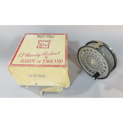 541 - A Hardy St Aidan fishing reel in it's original box,  and two further vintage fly fishing reels (3)