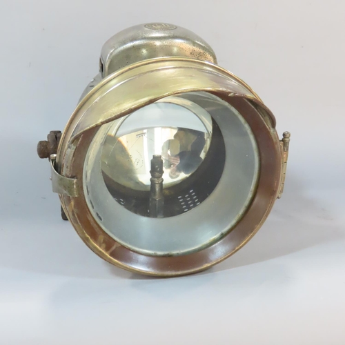 542 - A Vintage Powell & Hammer Ld Motorcycle headlamp.