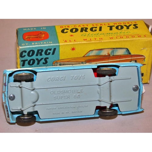 736 - Corgi Toys 235 Oldsmobile Super 88 - blue bodywork with white strip 4/4d with original box