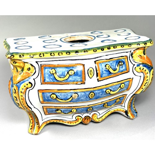 63A - A 19th century French Faience bulb vase in the form of a serpentine commode with shaped and painted ... 