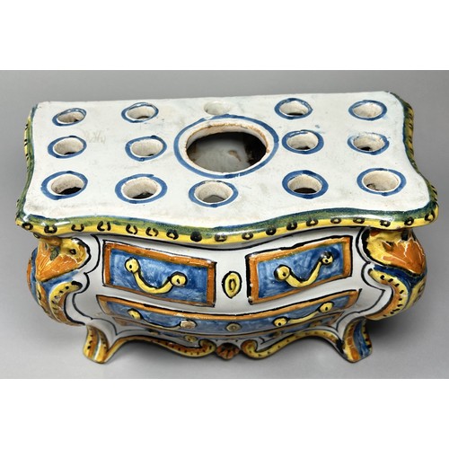 63A - A 19th century French Faience bulb vase in the form of a serpentine commode with shaped and painted ... 