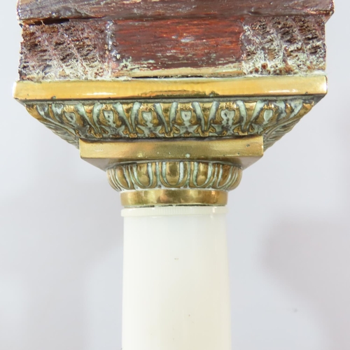 473 - An opaque white glass column candlestick with a stepped brass square base and brass sconce, adapted ... 