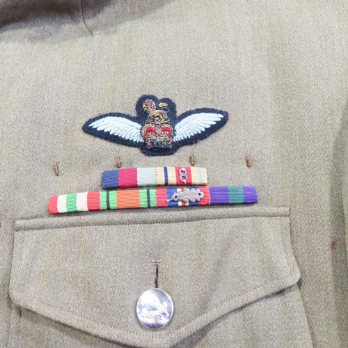 475 - Lt Col R Wheen British Army parade uniform, a jacket bearing two rows of ribbon medals and two pairs... 