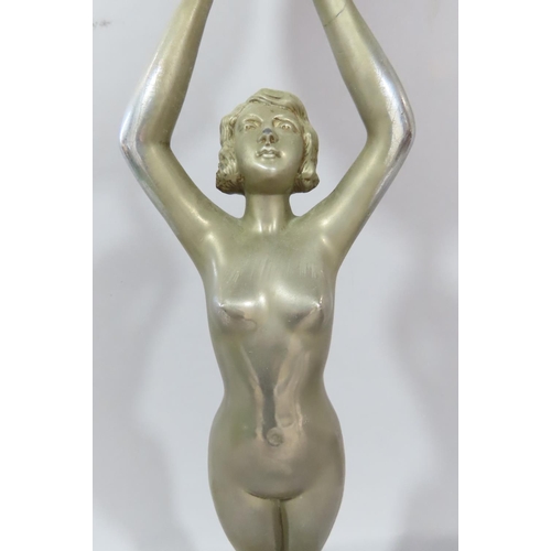 478 - A pair of Art Deco dressing table mirrors held aloft by nude female figures. 52cm high.