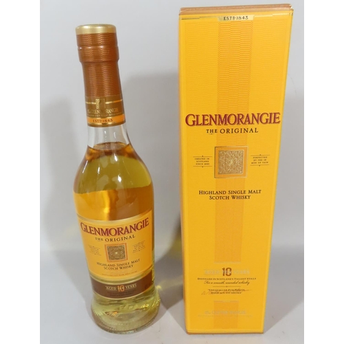 479 - Three bottles of Whisky, a 10 year Glenmorangie single malt 35cl, a Grant’s Millennium 70cl, and a 1... 