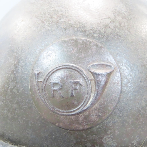 488 - A French WWI period trench helmet with applied 