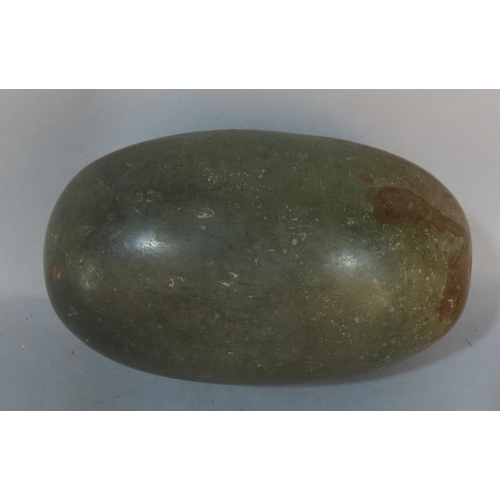 500 - A Shiva Lingam stone, 15cm wide.