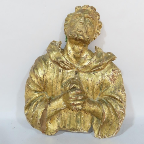 501 - An antique gilded wooden carving of a Saint or an Apostle, 18cm x 13cm, together with a bronze tile ... 