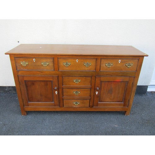 1562 - A good quality George III style kitchen dresser the T shaped arrangement of drawers and two cupboard... 