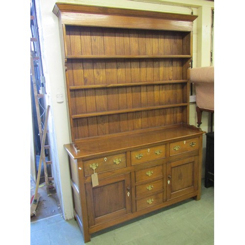 1562 - A good quality George III style kitchen dresser the T shaped arrangement of drawers and two cupboard... 