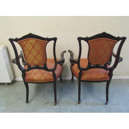 1567 - A pair of Edwardian drawing room chairs with upholstered backs and seats.