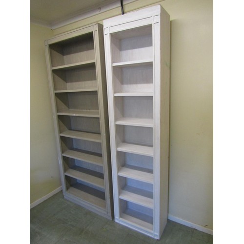 1569 - Two tall painted freestanding bookcases, the largest in a mottled grey finish, 225cm high,  89 x 25c... 