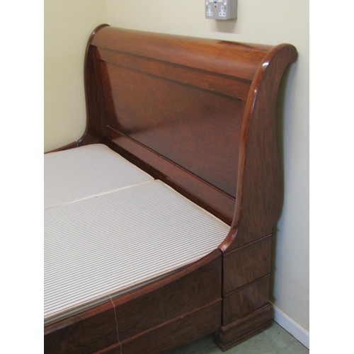 1574 - A large, good quality contemporary cherrywood sleigh double bed, to accommodate a 5ft mattress, 117c... 