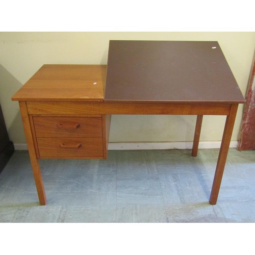 1576 - A vintage 20th century adjustable teak writing desk of small proportions, 72cm high, 115 x 60cm.